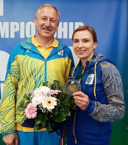 Олена Костевич з тренером